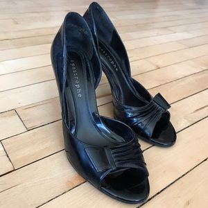 D’Orsay open-toe patent pumps